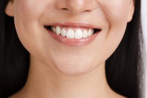 woman-s-smile-with-clear-skin-2048x1367